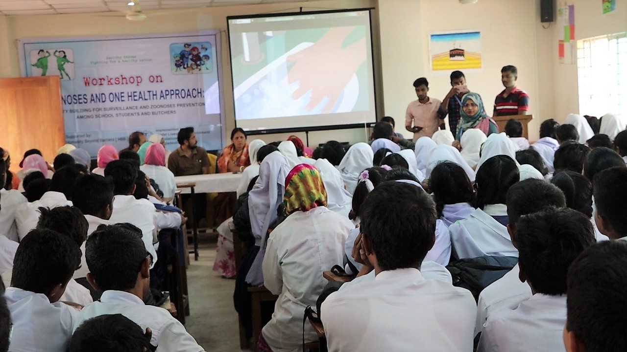 Students attending a presentation in a One Health classroom workshop
